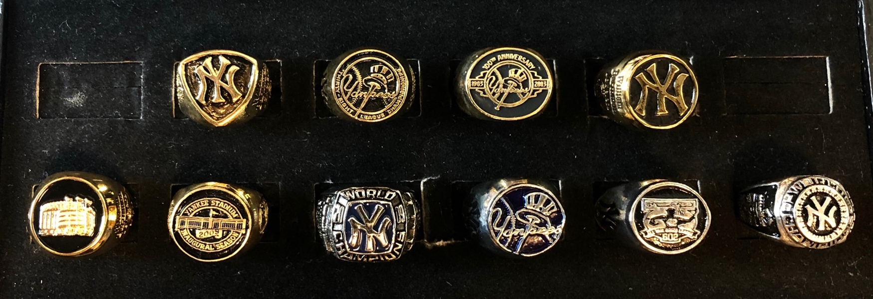 10 New York Yankee Fan Day rings. All size 8. Ring leatherette display box included