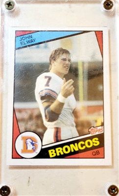 DENVER BRONCOS JOHN ELWAY UNSIGNED 1984 TOPPS CARD #63 SLABBED 